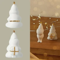 Räder Porzellanfigur Santa packt Geschenke